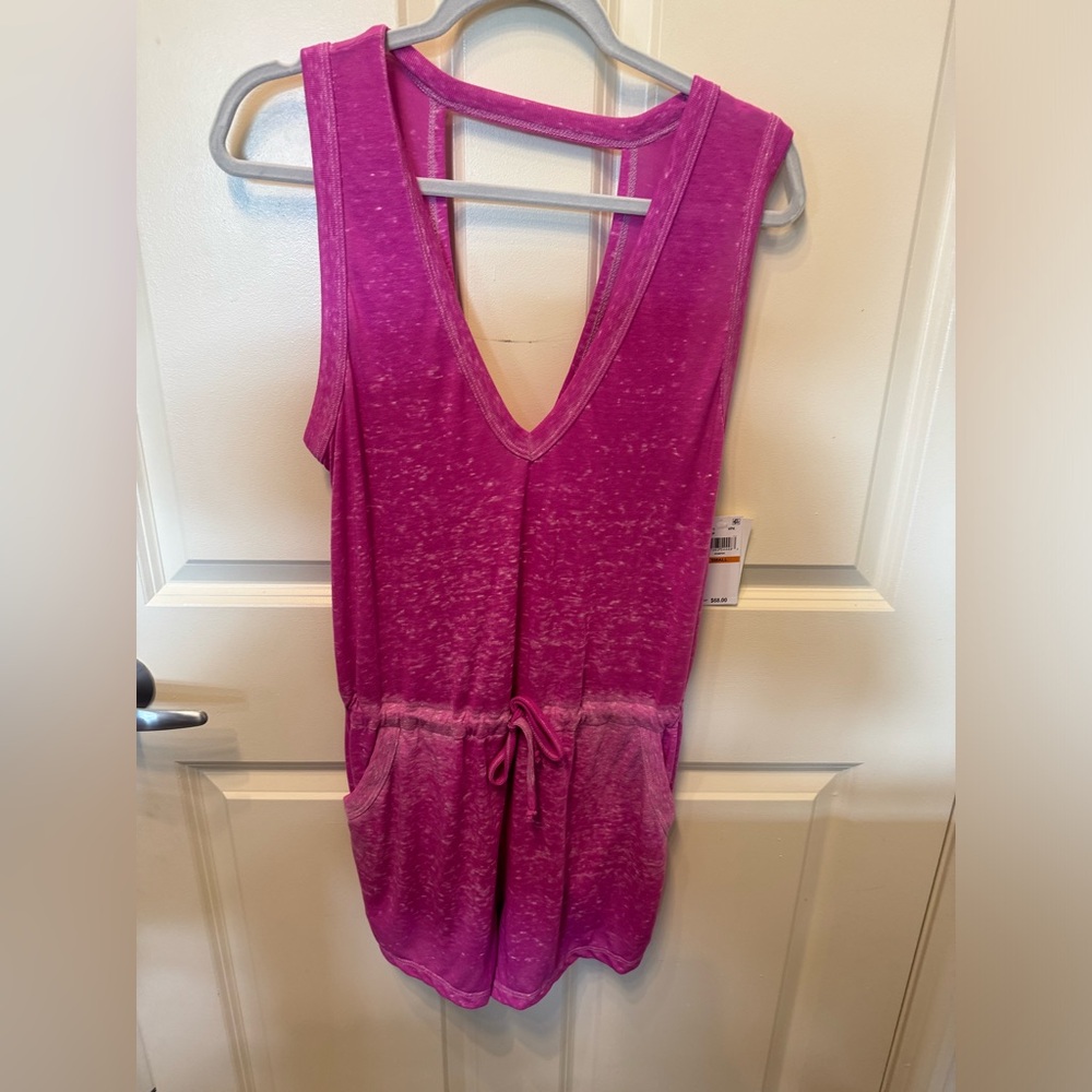 Brand new Becca romper size small